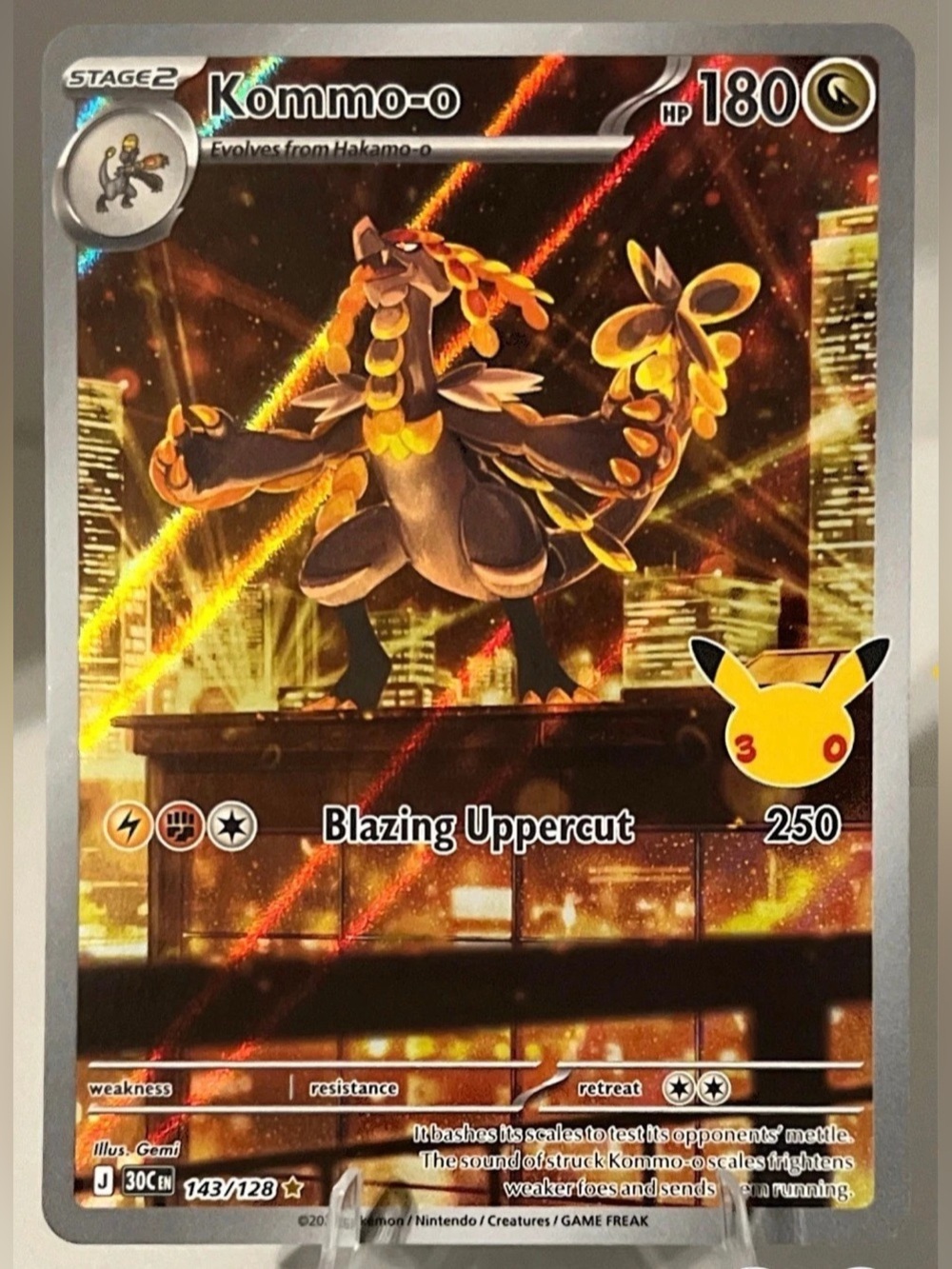 Pokémon TCG: 30th Celebration - KOMMO-O 143/128 NM
